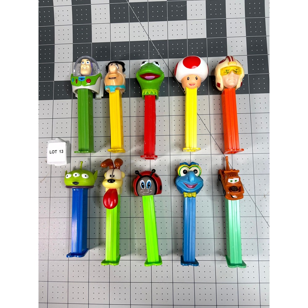 Lot of 10 Vintage Pez Dispensers Star Wars Disney Pixar Muppets Mario Fred Odie